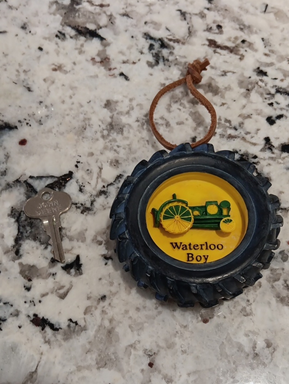 Vintage Waterloo Boy Tractor Tire Ornament And A John Deere Marked Key